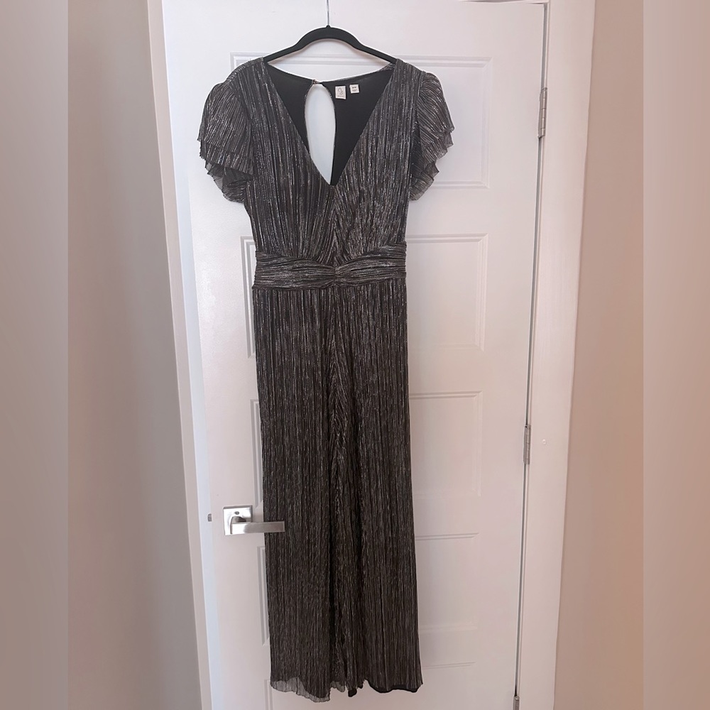 Flattering dressy jumpsuit. Size M. Wedding or Disco party. Classy with a shine